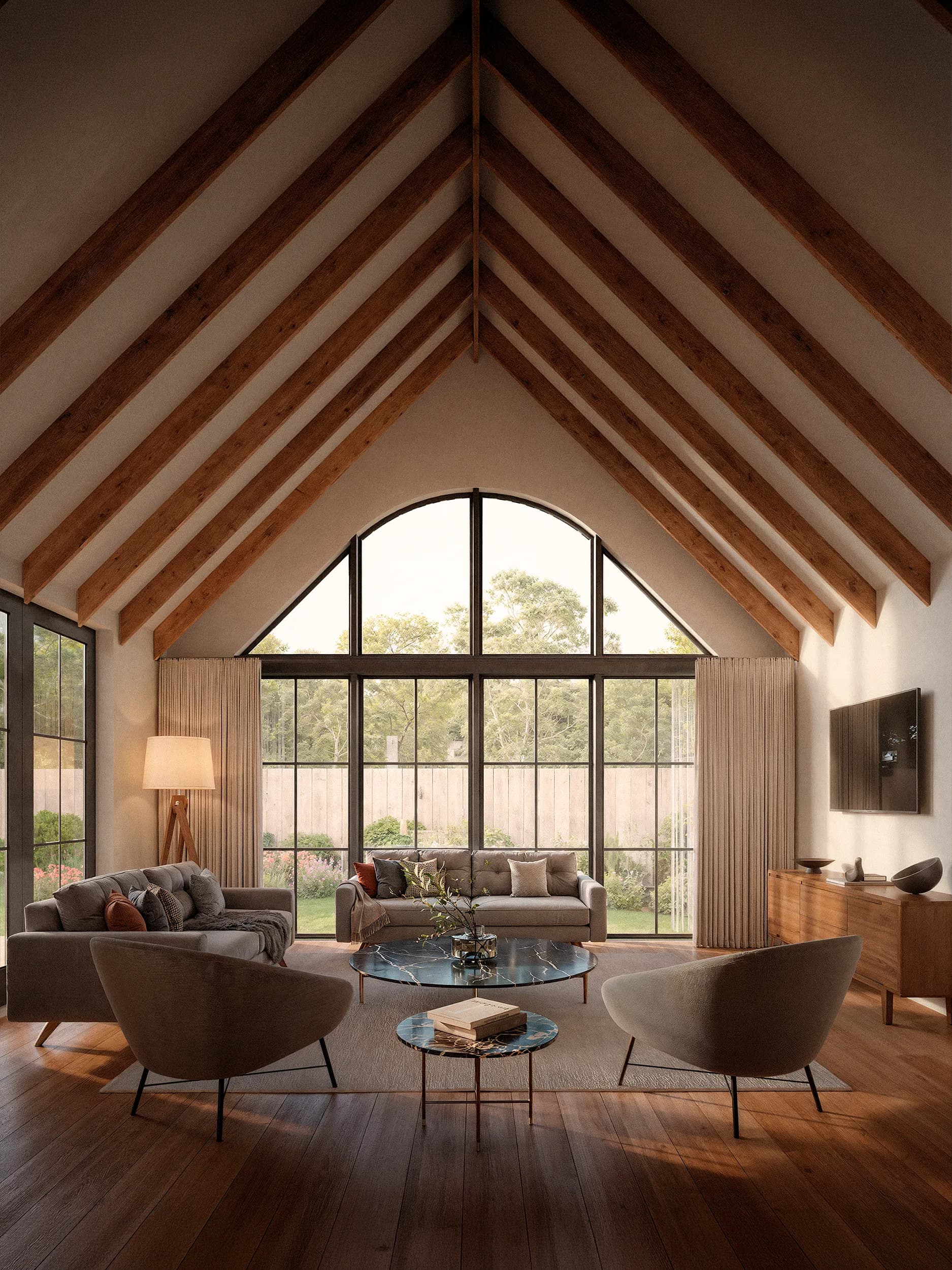 Emerald Forest smaller home vaulted living room with floor-to-ceiling windows.